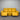 Yellow sofa against a metallic shutter background