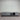 Front view of the Zen Entertainment Unit in graphite grey with drawers and doors closed