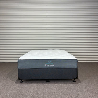 Mattress with 'Pensance' branding on a gray background
