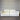 White sofa against a corrugated metal wall
