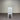 White chair against a corrugated metal wall. Kinloch collection