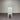 White chair against a corrugated metal wall. Kinloch collection