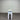White stool against a corrugated metal wall