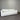 White soft fabric sofa 2 seater against a metallic wall