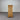 Wooden cabinet against a corrugated metal wall