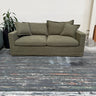 Violet Sofa Bed — olive khaki fabric three seater with scatter cushions