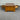 pine Wood coffee table with two drawers on a gray floor. wanaka collection