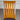 Wanaka Wooden chair with a slatted backrest on a gray floor - Wanaka Collection