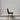 Slim dining chair side view showing seat contour and tapered legs