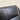 Close up view of padded armrest on black leather manual recliner chair