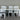 White outdoor furniture set on a gray surface