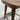 Close-up of a wooden stool with a blurred background