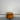 Wanaka Lamp Table with drawer open showing storage space, chestnut pine finish – Direct Furniture Outlet NZ.