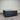 Workhorse LUX mattress front angle view showing quilted top, black fabric base, and brand label against corrugated backdrop
