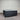 Workhorse LUX mattress front angle view showing quilted top, black fabric base, and brand label against corrugated backdrop