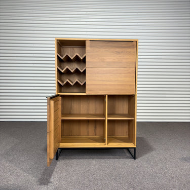Lower cabinet door open showing two storage compartments