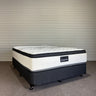 Mattress with 'Andromeda' branding on a gray background