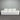 White sofa against a metallic wall