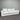 White sofa against a metallic wall