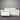 White sofa against a metallic wall