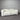 White sofa against a corrugated metal wall