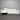 White sofa against a corrugated metal wall