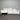 White sofa against a corrugated metal wall