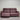Burgundy leather sofa against a metallic shutter background