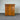 Wooden dresser with multiple drawers against a corrugated metal wall - wanaka collection