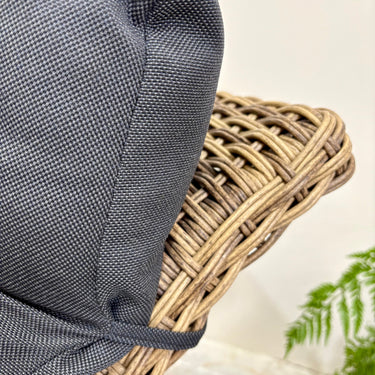 Close-up of wicker weave and charcoal cushion fabric texture on Dario Outdoor Sunlounge