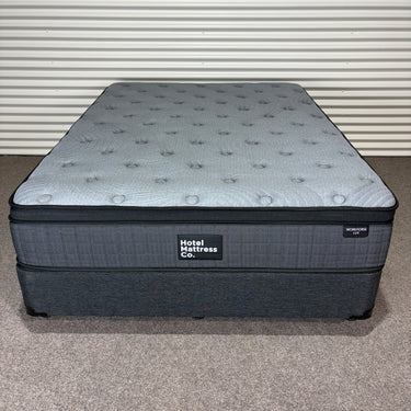 Top view of Workhorse LUX mattress showing grey quilted five-zone pattern and cool-gel layer design
